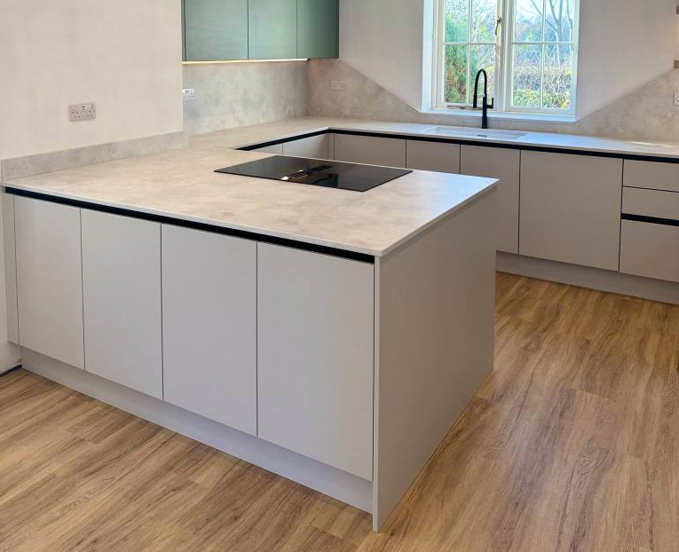 A photo of a Handleless Kitchen created by Studio 10 Kitchens